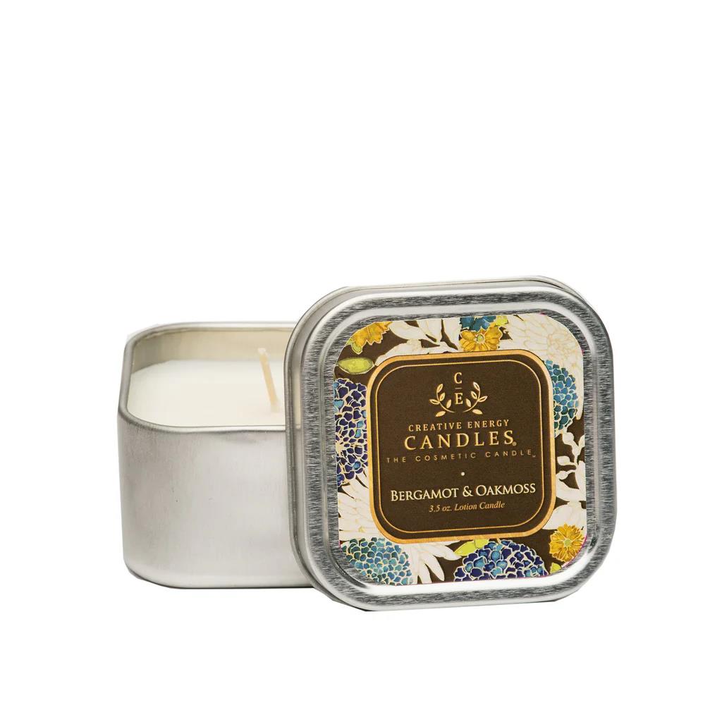 Square tin of Bergamot & Oakmoss candle with floral label.