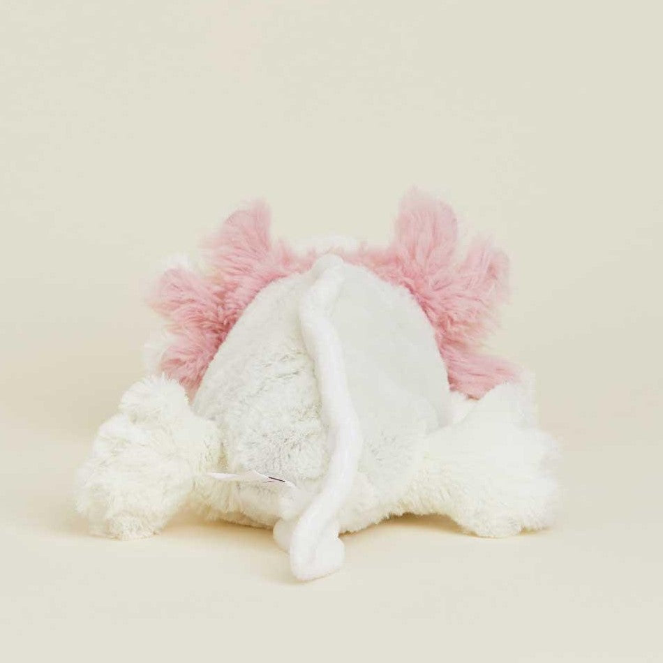 Fluffy, pink-and-white plush toy on a plain background.