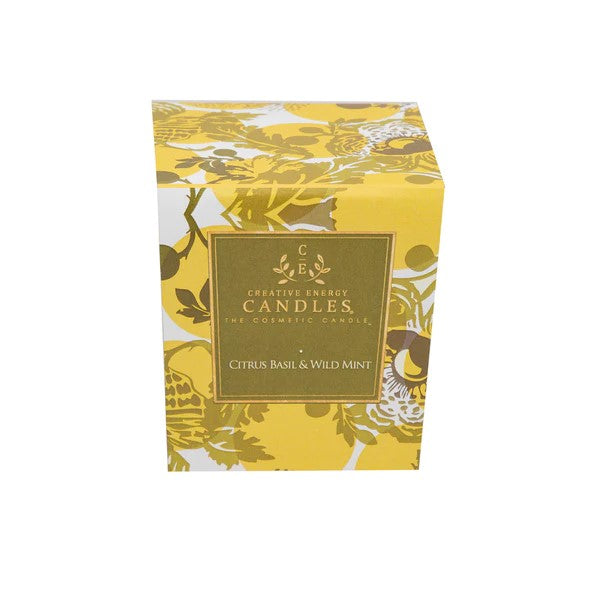 Yellow floral candle box labeled "Citrus Basil & Wild Mint".