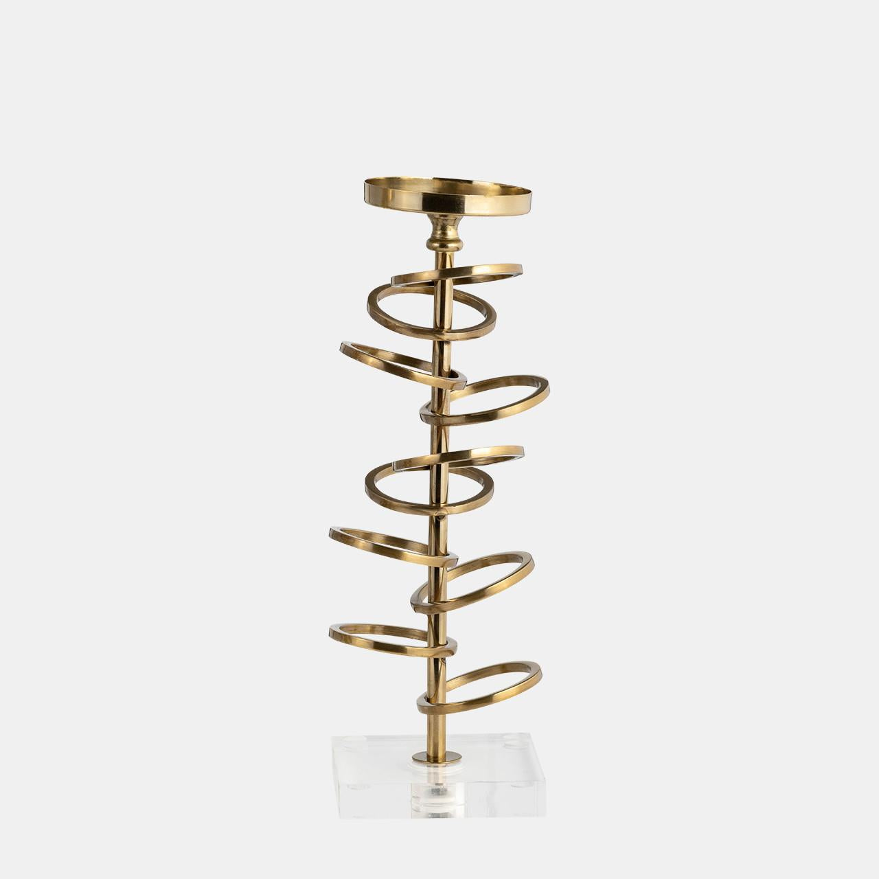 Gold spiral candle holder on a clear base.
