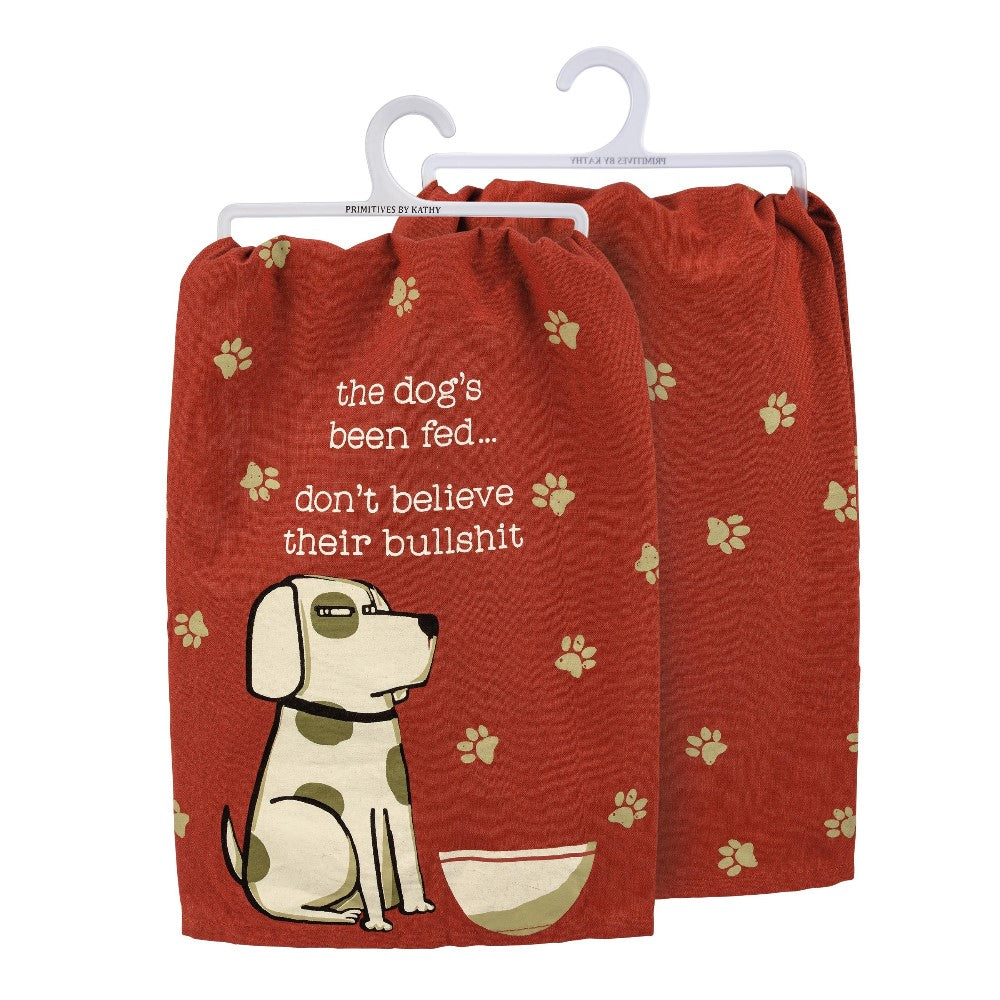Red towels with a dog and humorous text about feeding.