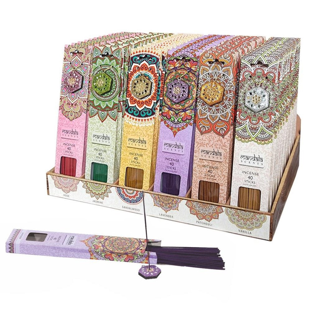Display of colorful incense boxes with intricate designs.