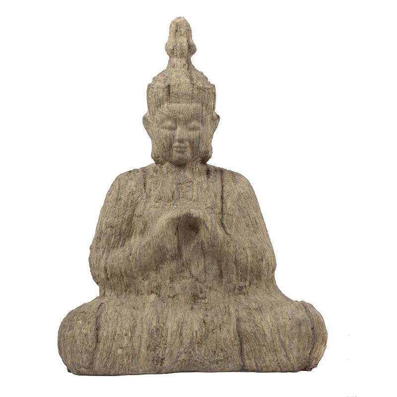 Stone statue of a seated figure in meditation.