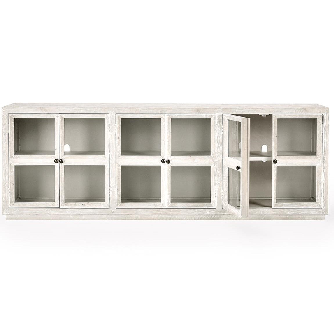 White wooden cabinet with glass doors; one door is open.