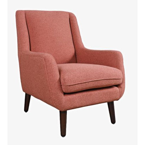 Modern pink armchair with tapered wooden legs.