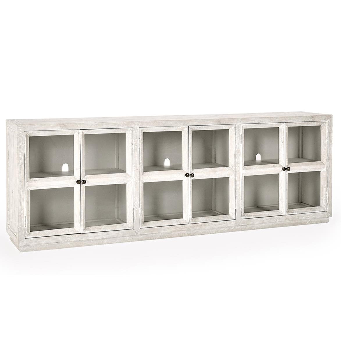 White wooden cabinet with glass-paneled doors and metal knobs.
