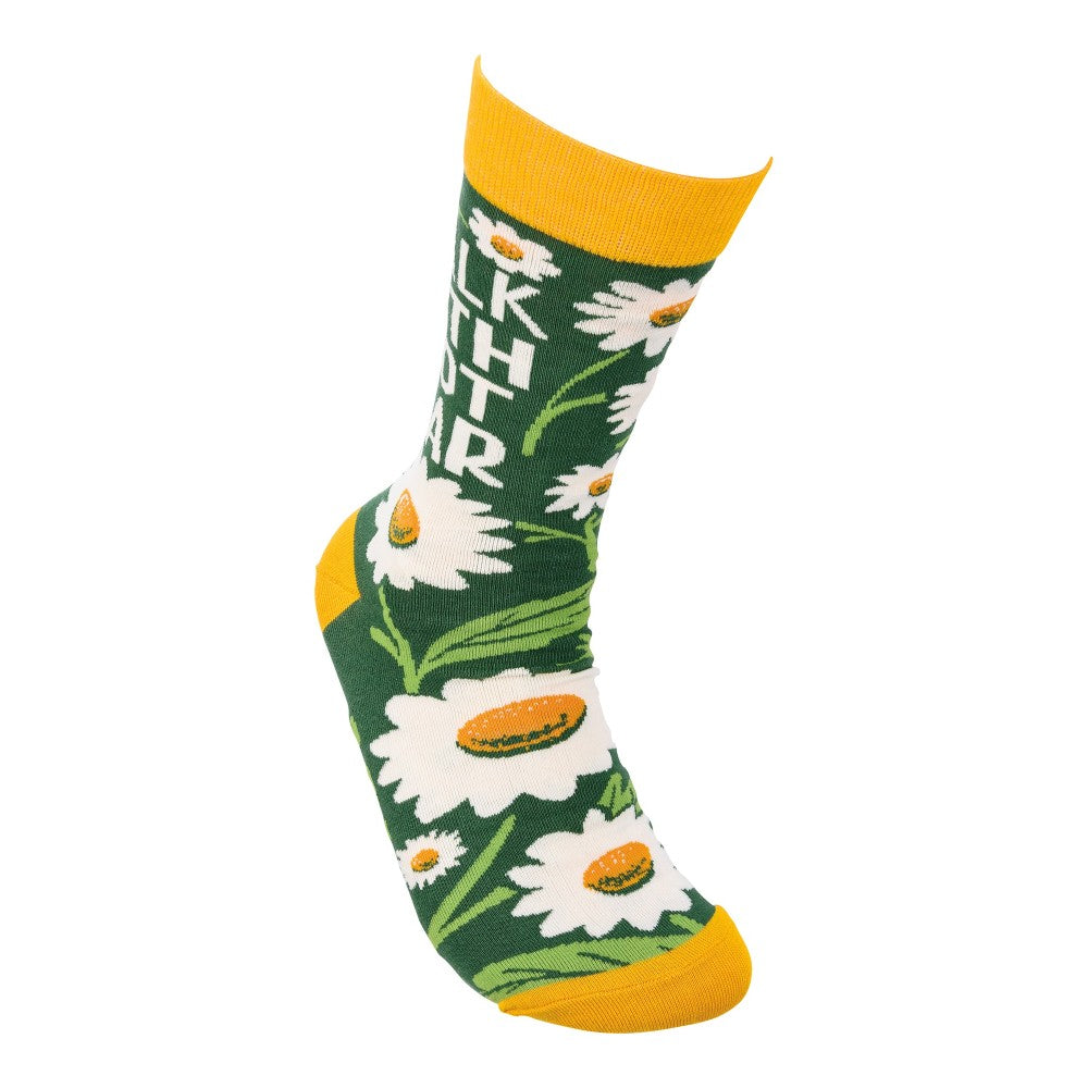 Green sock with daisies and yellow toe and cuff.