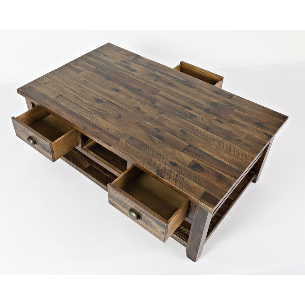Rustic wooden coffee table with open drawers.
