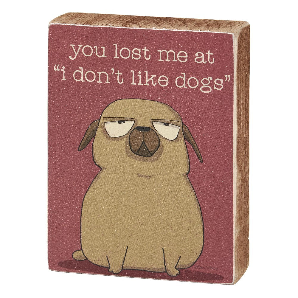 Grumpy dog cartoon with "you lost me at 'I don't like dogs'" text.
