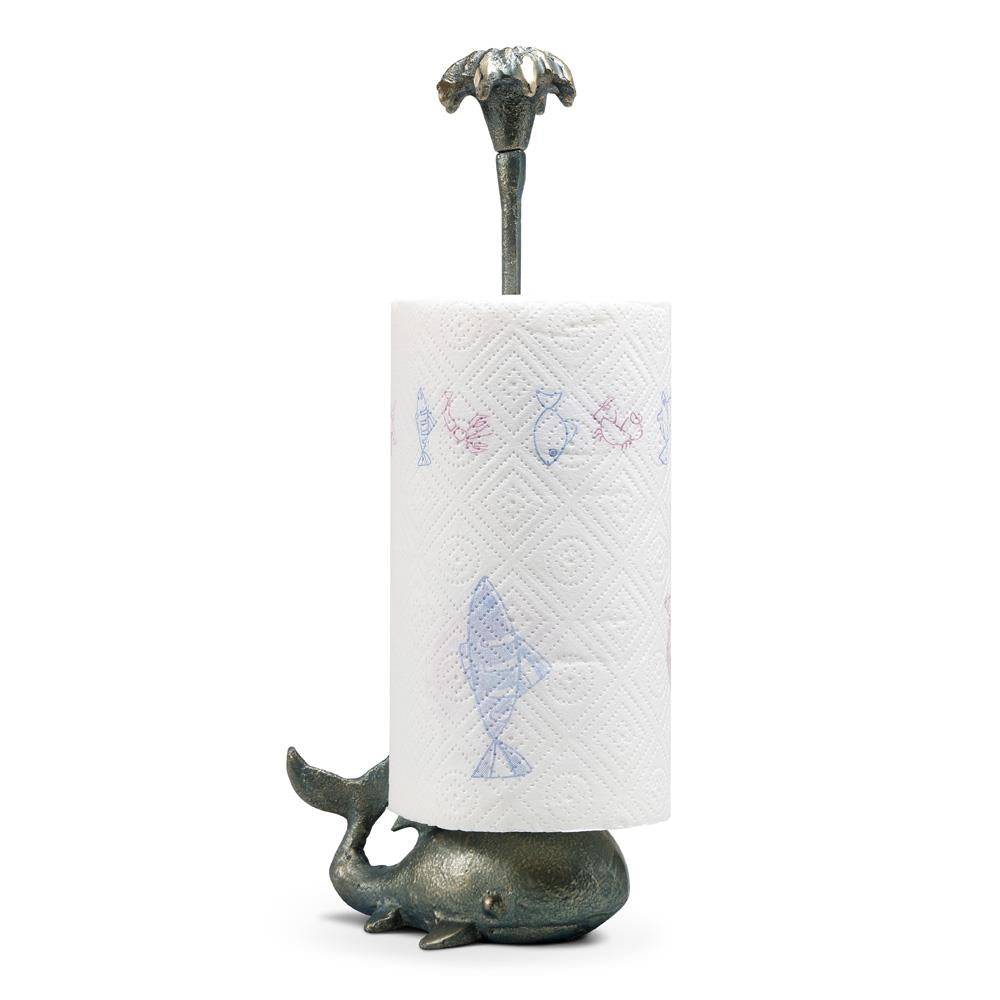 Whale-shaped paper towel holder with decorative design.