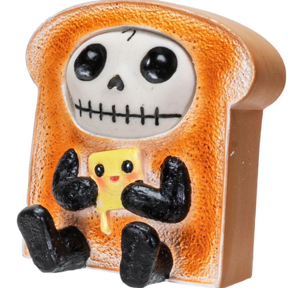 Skeleton toast figure holding a smiling butter pat.
