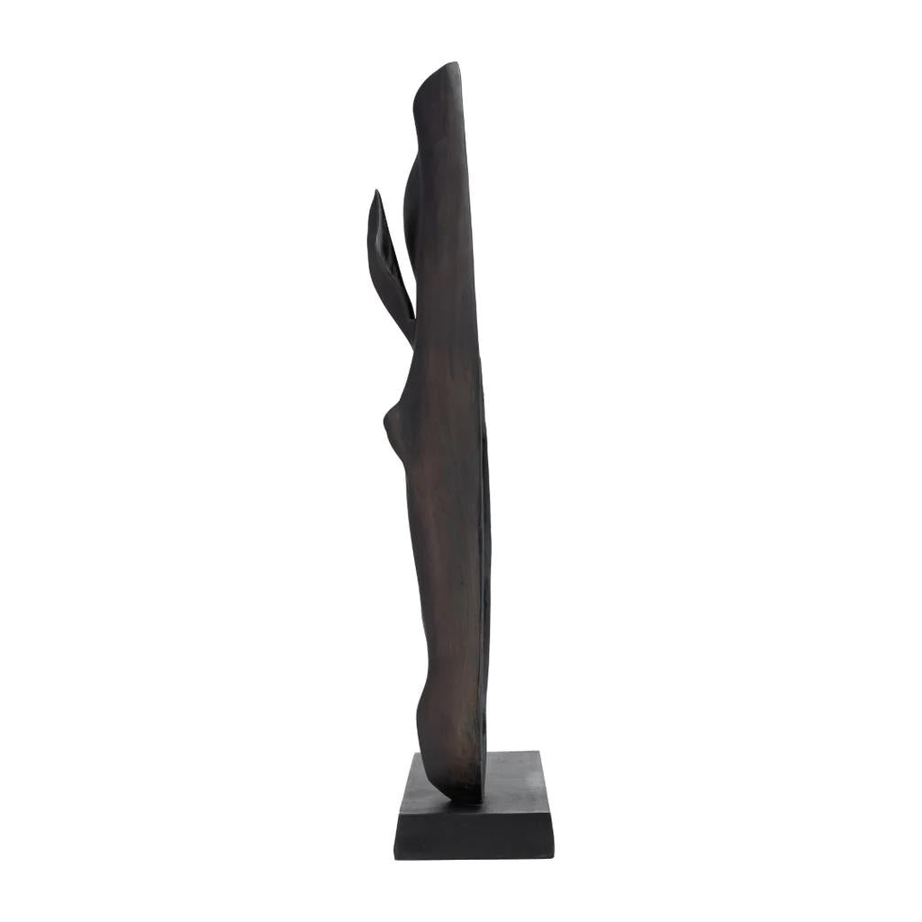 Side view of a sleek black abstract sculpture on a square base.