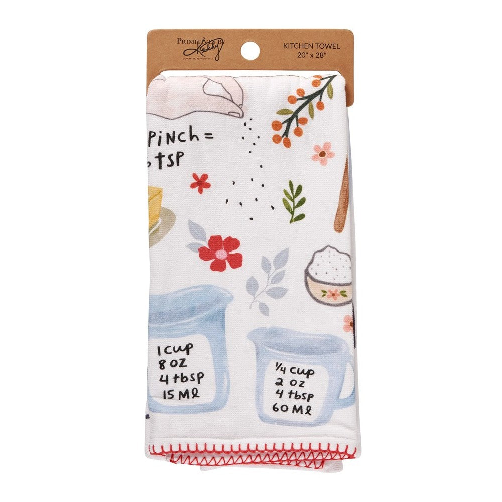 Floral kitchen towel with cooking measurements and illustrations.