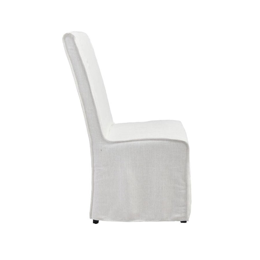White upholstered chair, side view.