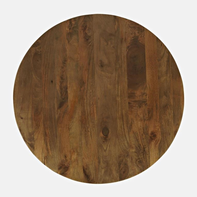 Round wooden table top with distinct grain patterns.