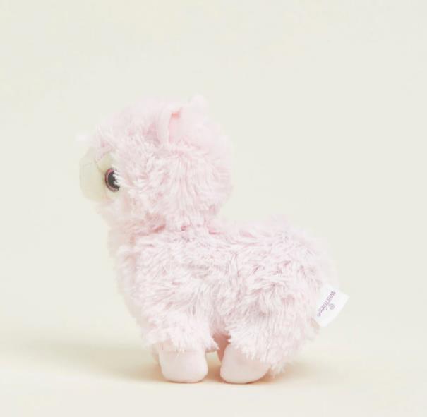 Fluffy pink llama plush toy on a plain background.
