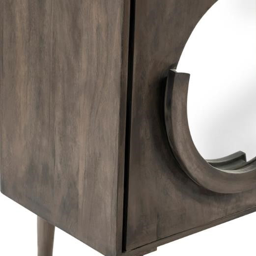 Wooden furniture with curved design and partial mirror reflection.