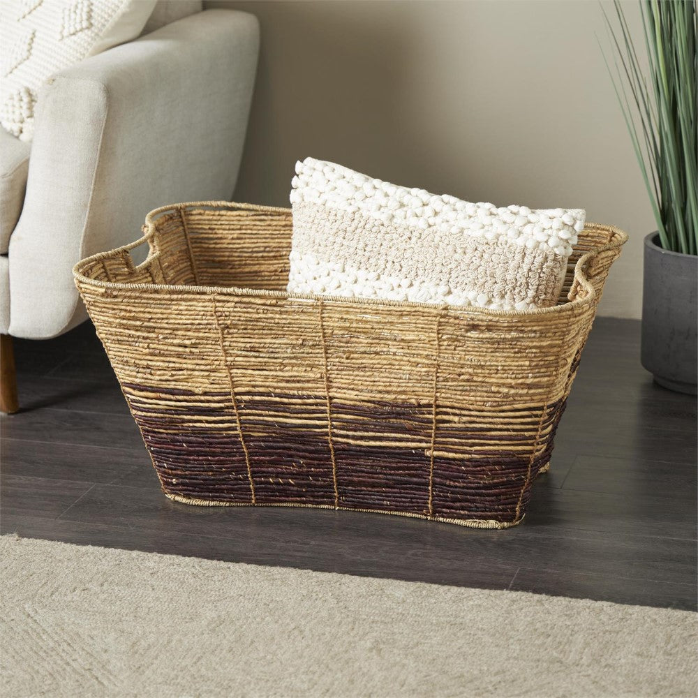 Woven basket with a textured pillow beside a chair.