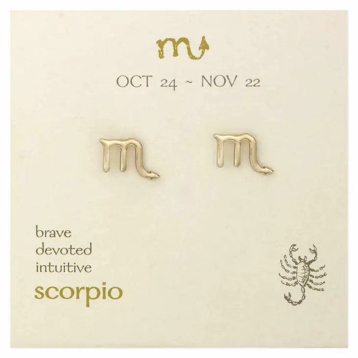 Gold Scorpio earrings on a zodiac-themed card.