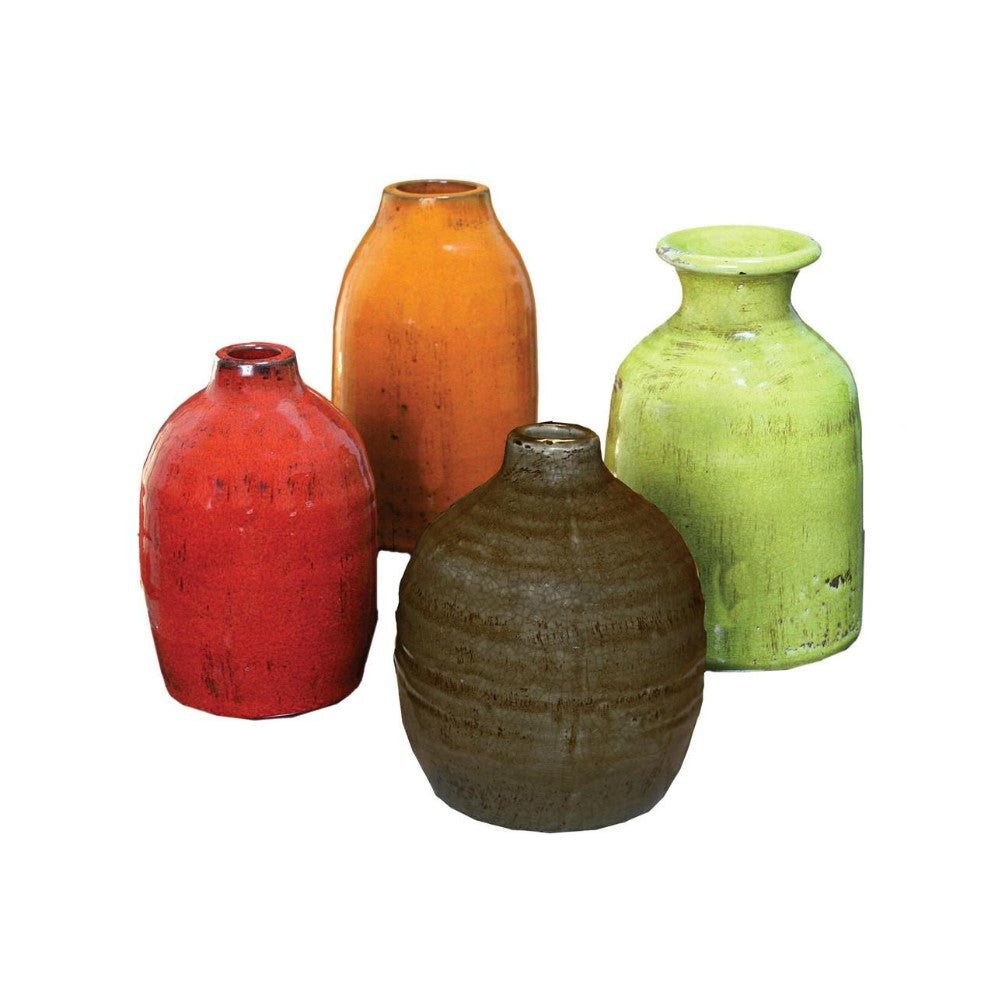 Four colorful ceramic vases on a white background.