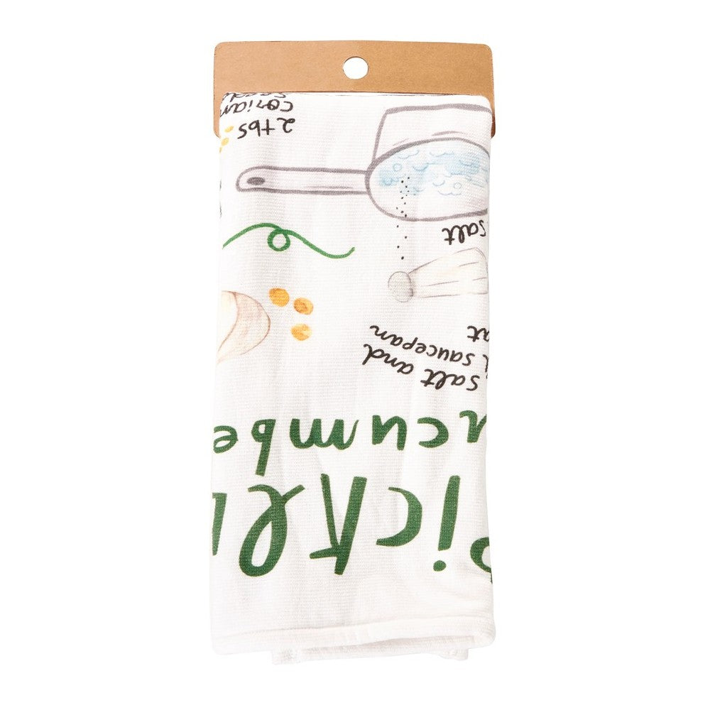 Tea towel with cooking illustrations and green text.