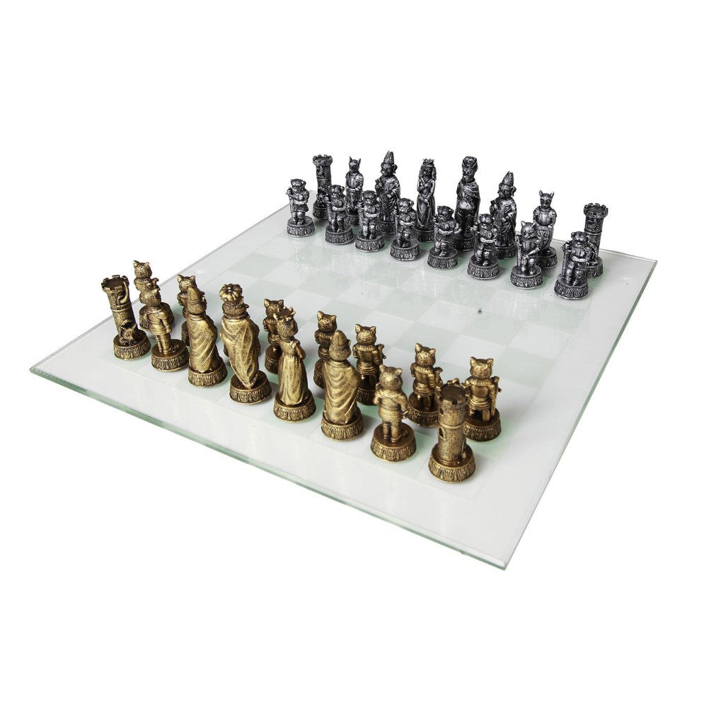 Ornate chess set with cat-themed metallic pieces on a glass board.