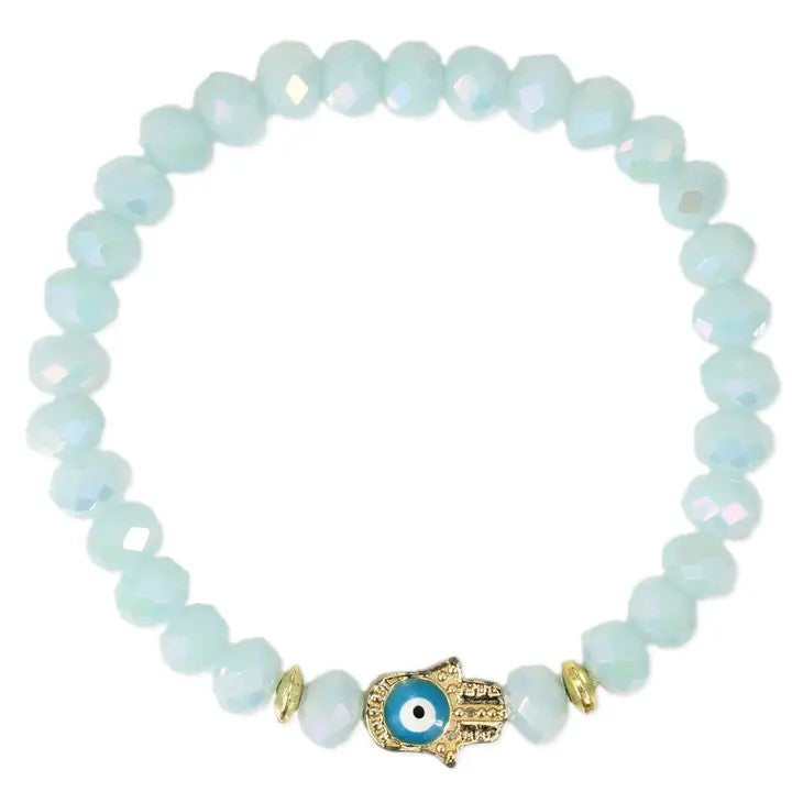 Beaded bracelet with blue beads and a Hamsa charm.