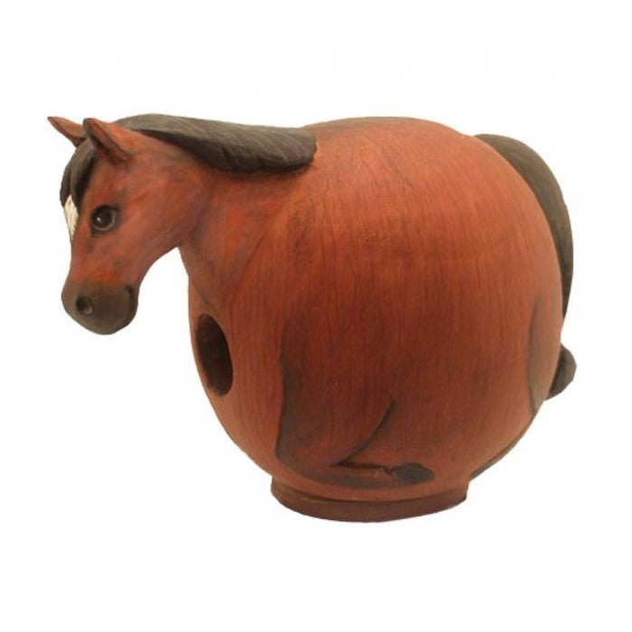 Round horse-shaped clay sculpture with a hole.