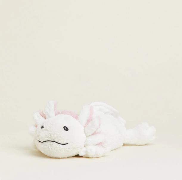White plush axolotl toy on a light background.