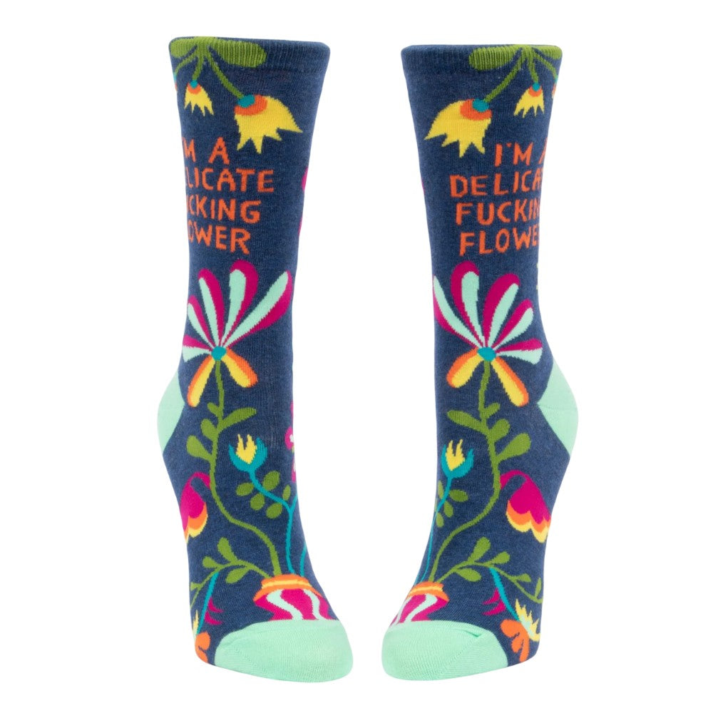 Colorful socks with floral patterns and bold text.