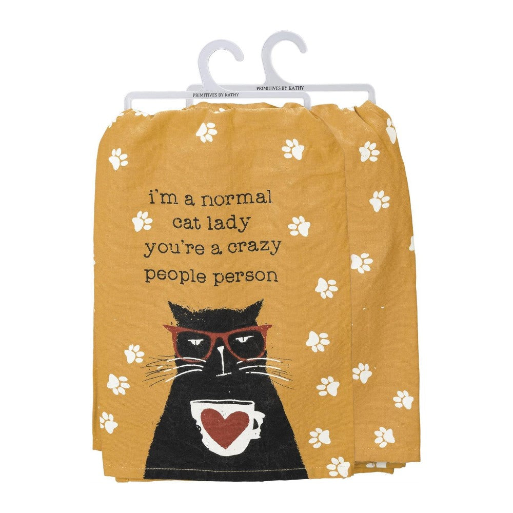 Yellow towel with cat print, glasses, and humorous text.