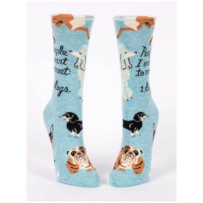 Blue socks with dog illustrations and "People I want to meet: 1. Dogs" text.