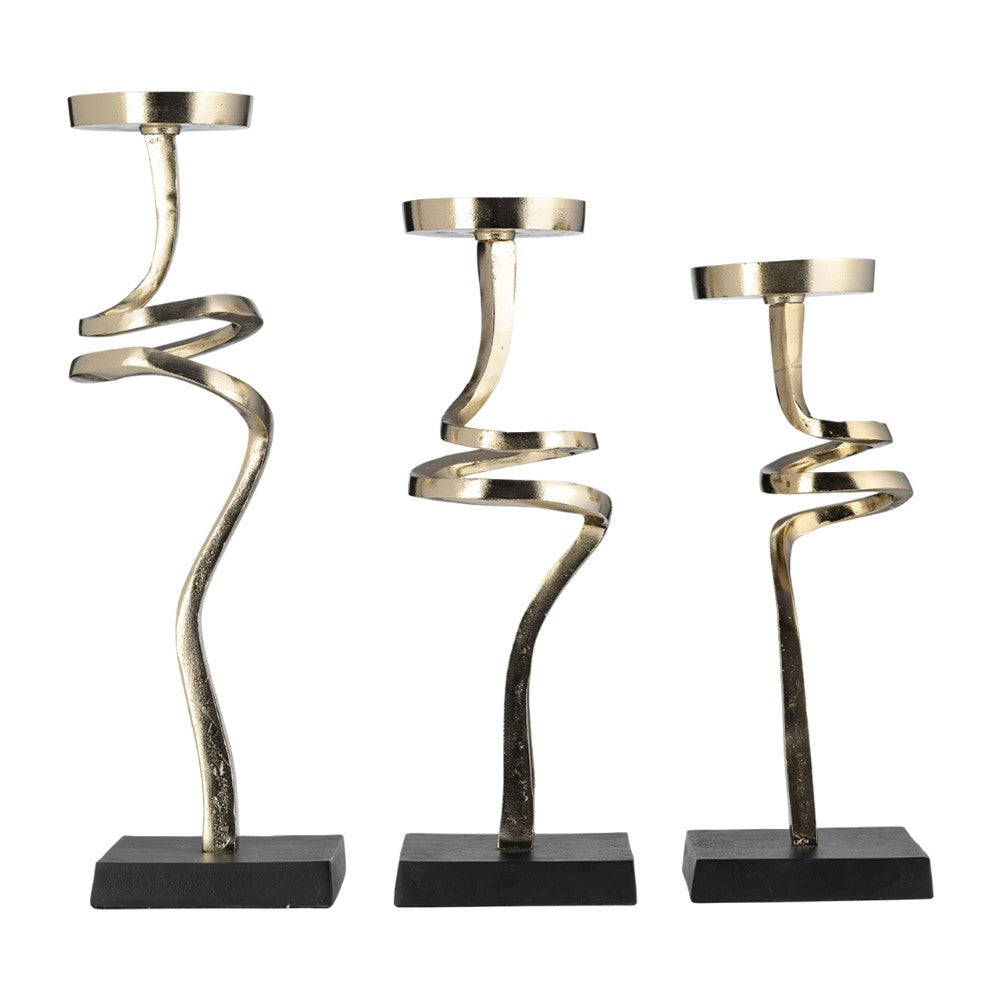 Three gold twisted candle holders on black bases.