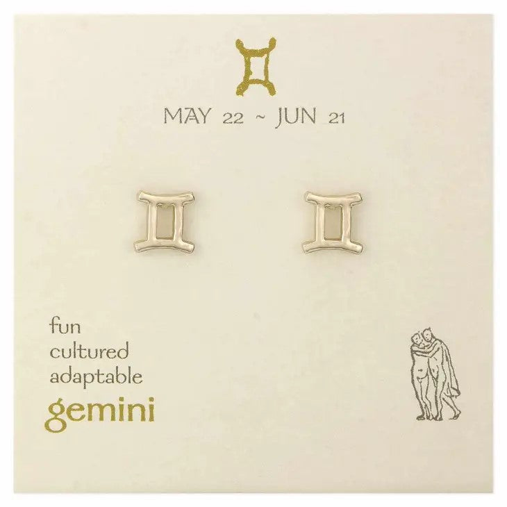 Gemini earrings on a zodiac-themed card.