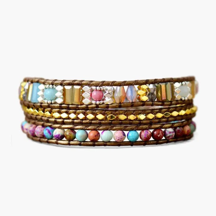 Colorful beaded bracelets with golden accents.