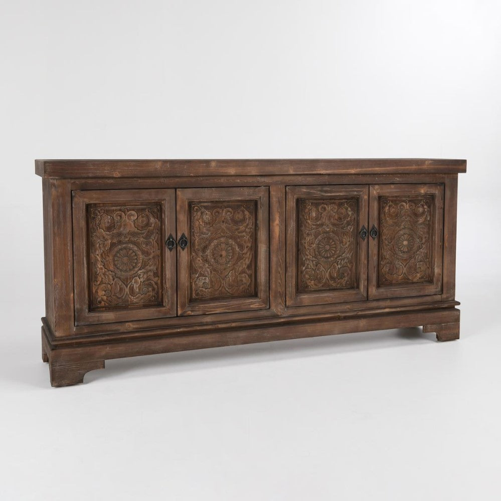 Ornate wooden cabinet with intricate carved designs on four doors.