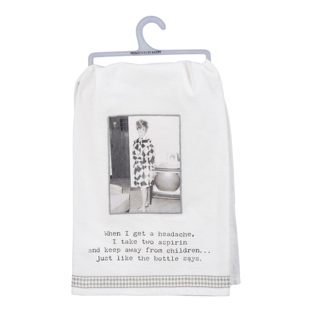 White towel with vintage photo and humorous aspirin quote.