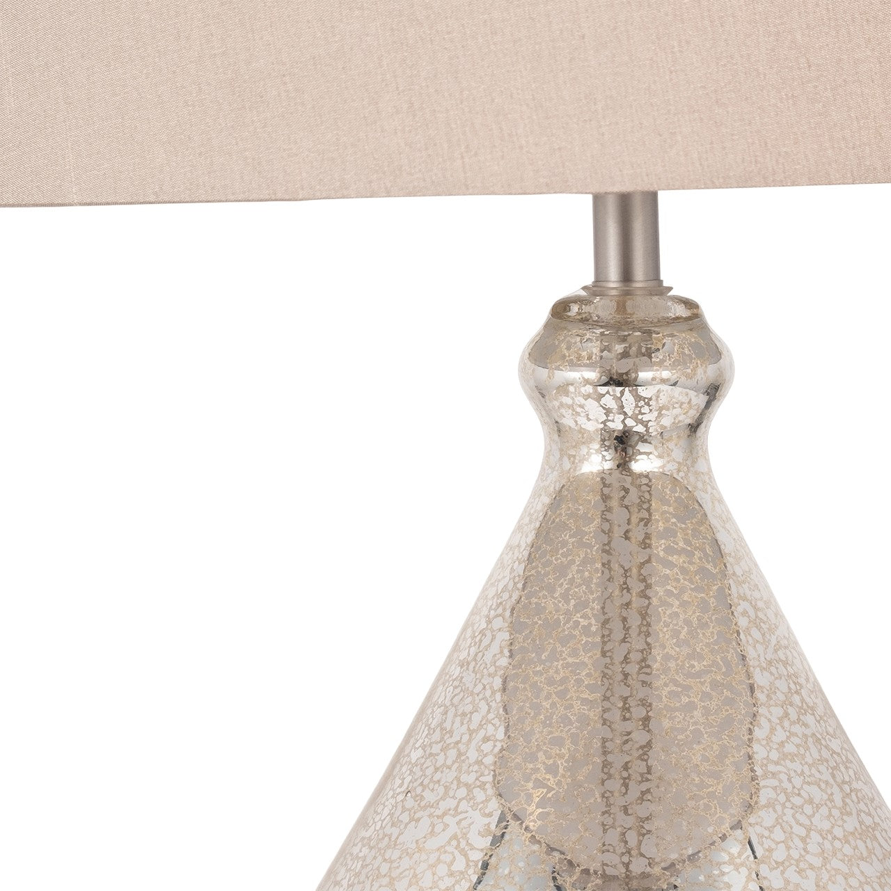 Silver textured lamp base with beige shade.