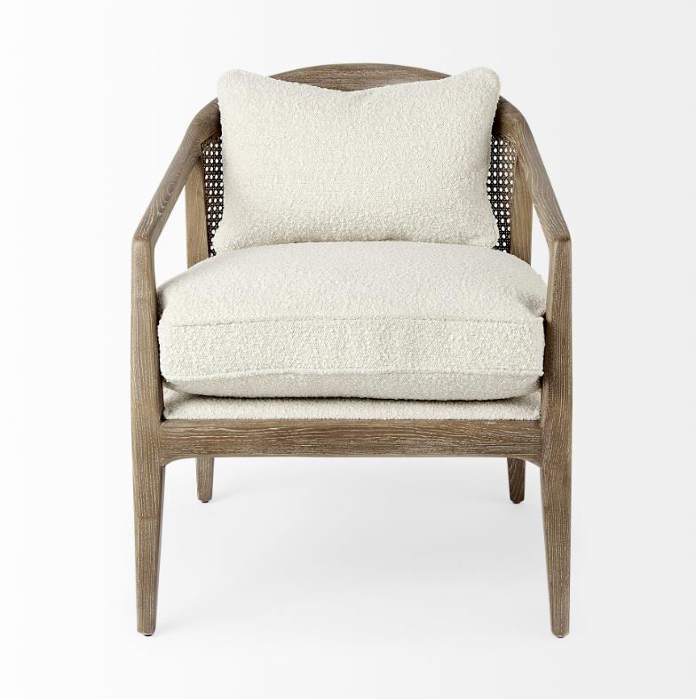 Beige cushioned armchair with wooden legs and backrest.