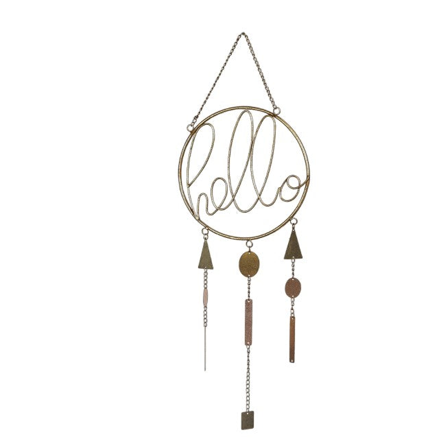 Hanging metal decor with "hello" and geometric shapes.
