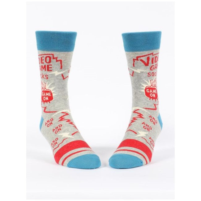 Grey socks with video game theme, blue cuffs and toes, red patterns.