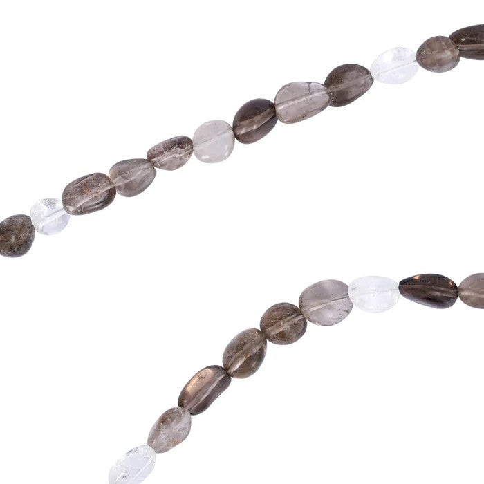 Brown and clear oval beads on a string.