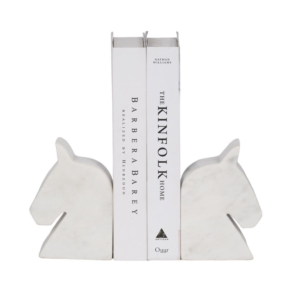 Bookends with horse head design hold two books upright.