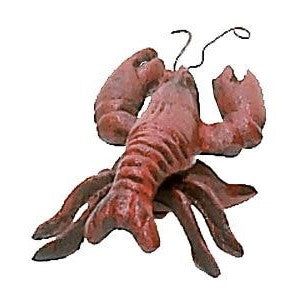 Red lobster figurine on a white background.