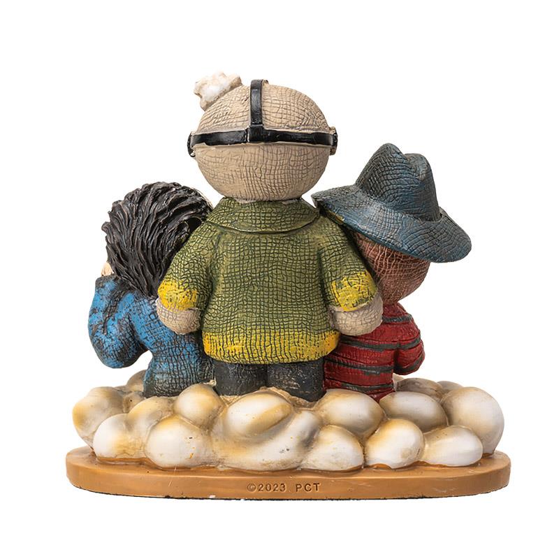 Three clay figures standing close together on a cloud.
