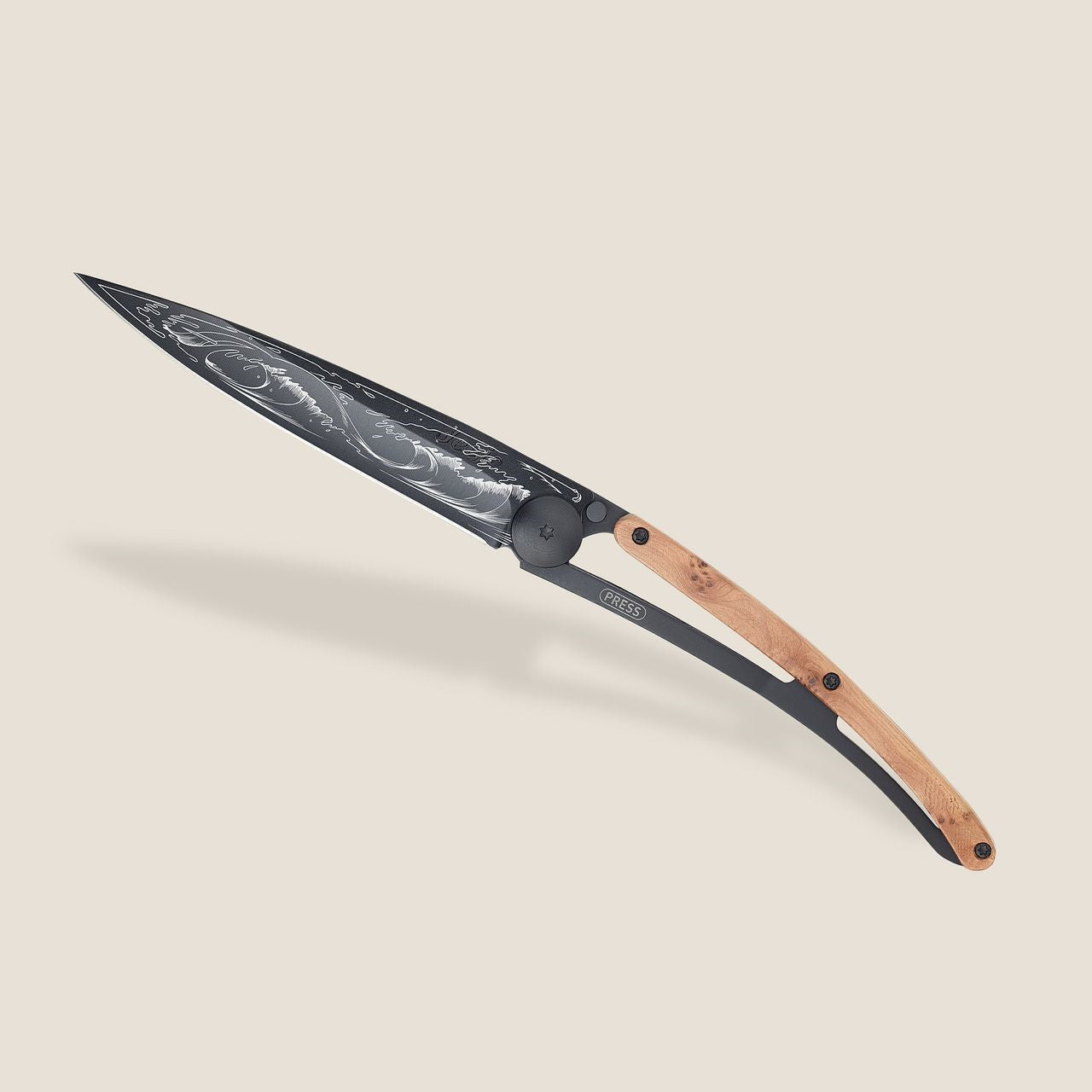Elegant wooden-handled knife with intricate blade design.