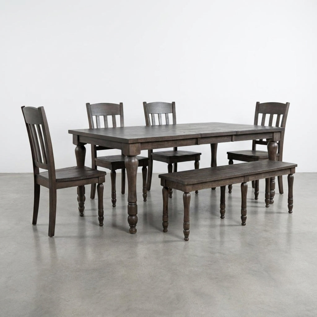 Wooden dining table set with four chairs and a bench.