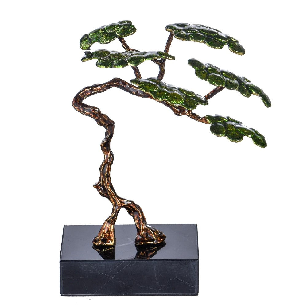 Metal bonsai sculpture on black base.