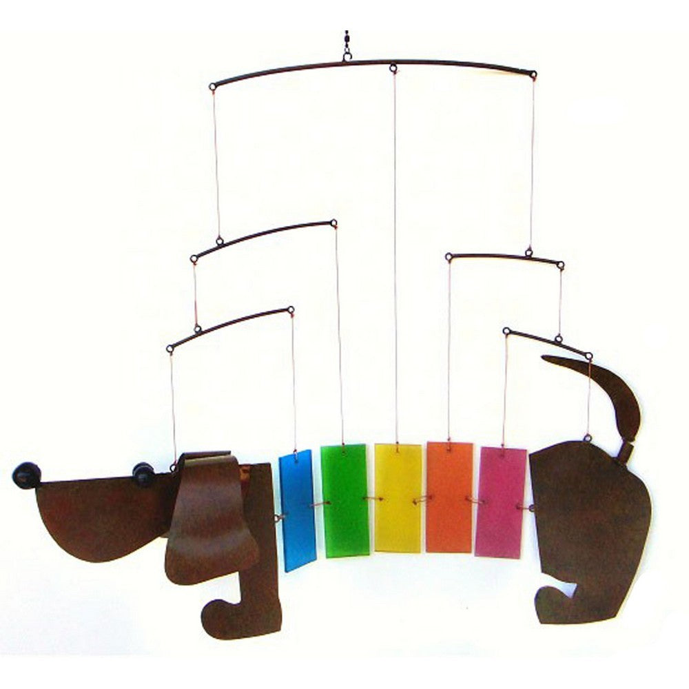Metal dachshund mobile with colorful hanging panels.