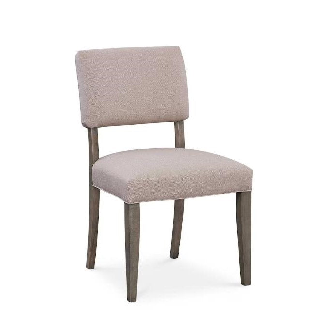 Upholstered chair with wooden legs and a beige fabric seat and backrest.